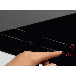 Встраиваемая электрическая варочная панель Electrolux EHF6547FXK (Black) Thumb