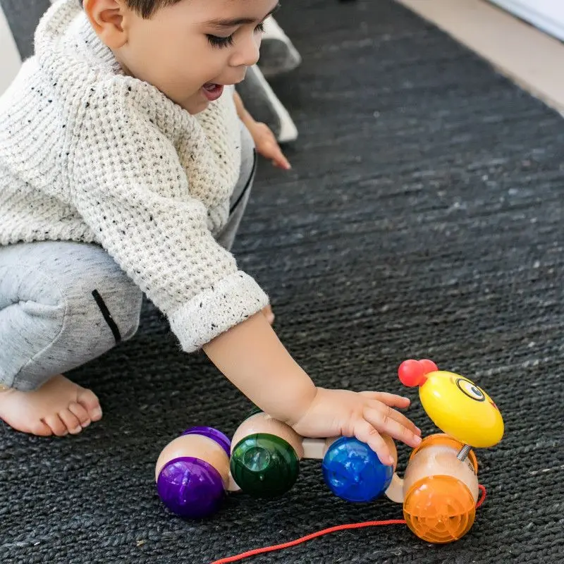 Jucarie de tragere Baby Einstein Inch Along Cal