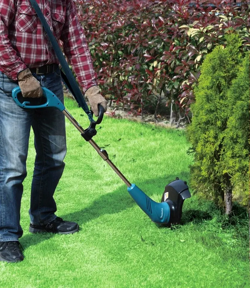 Триммер электрический Makita UR3000 - 4
