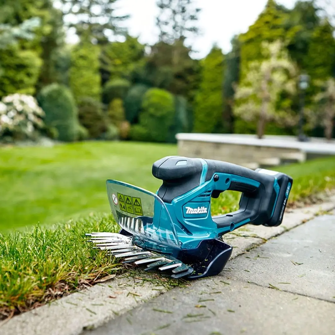 Аккумуляторные садовые ножницы-кусторез Makita UM600DZX Solo - 5